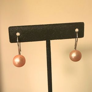 Peach colored freshwater Pearl earrings with 925 silver ear wires. By Honora.